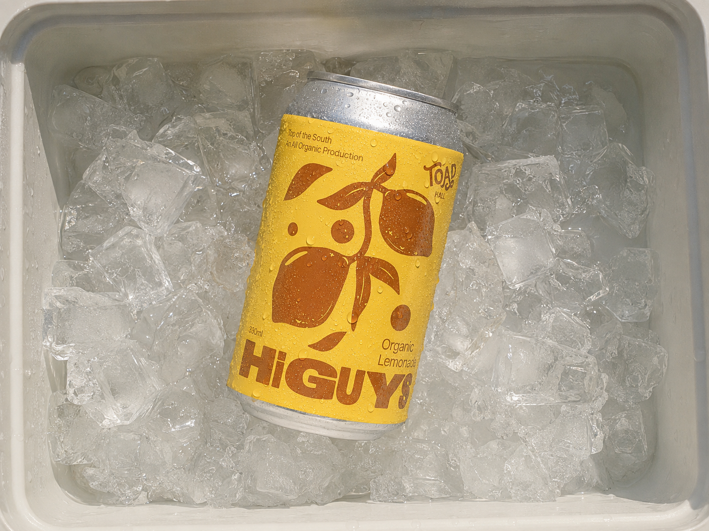 A cold Hi Guys Organic Lemonade can resting in a cooler filled with ice