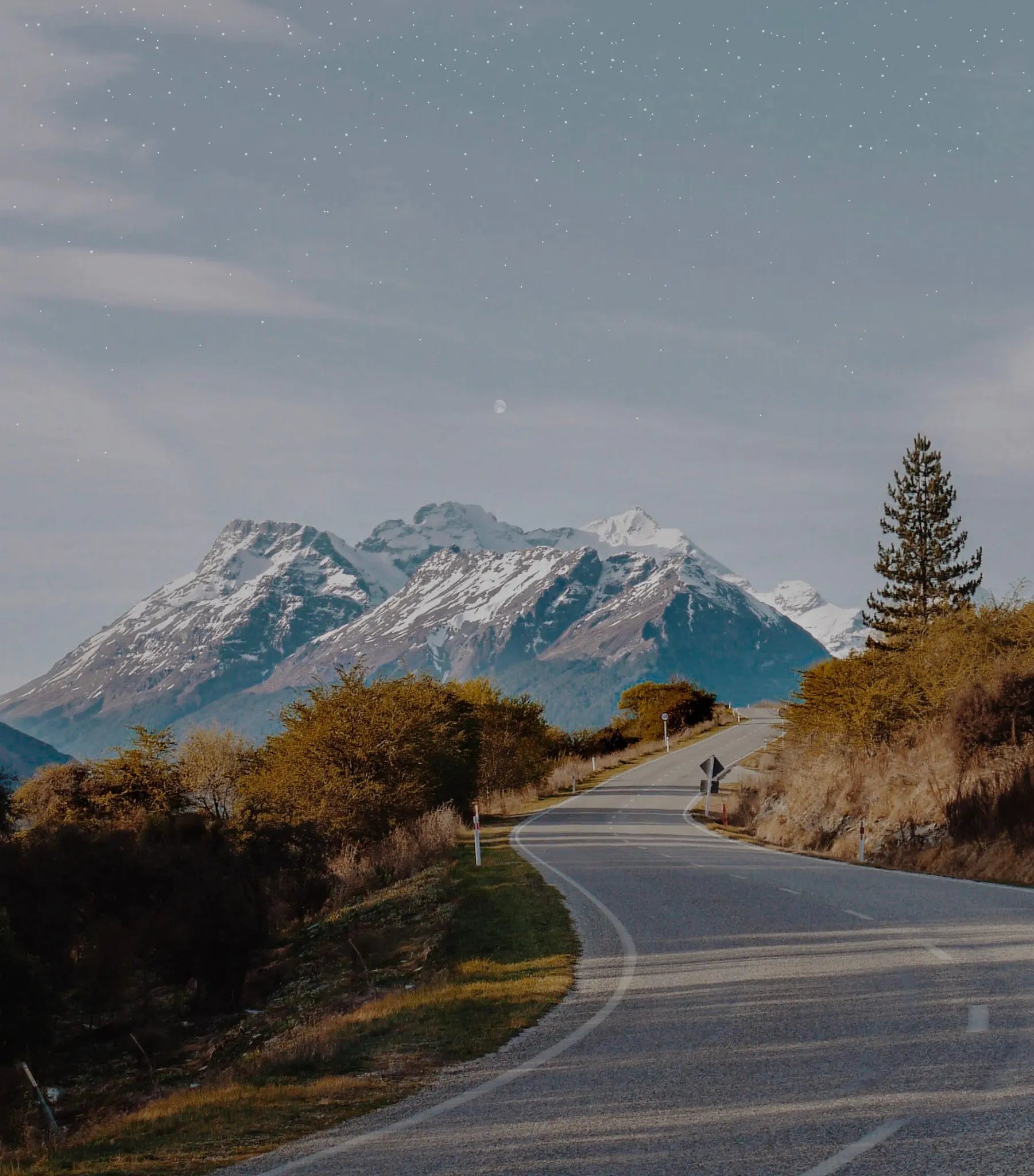 A road winding toward the mountains in Aotearoa